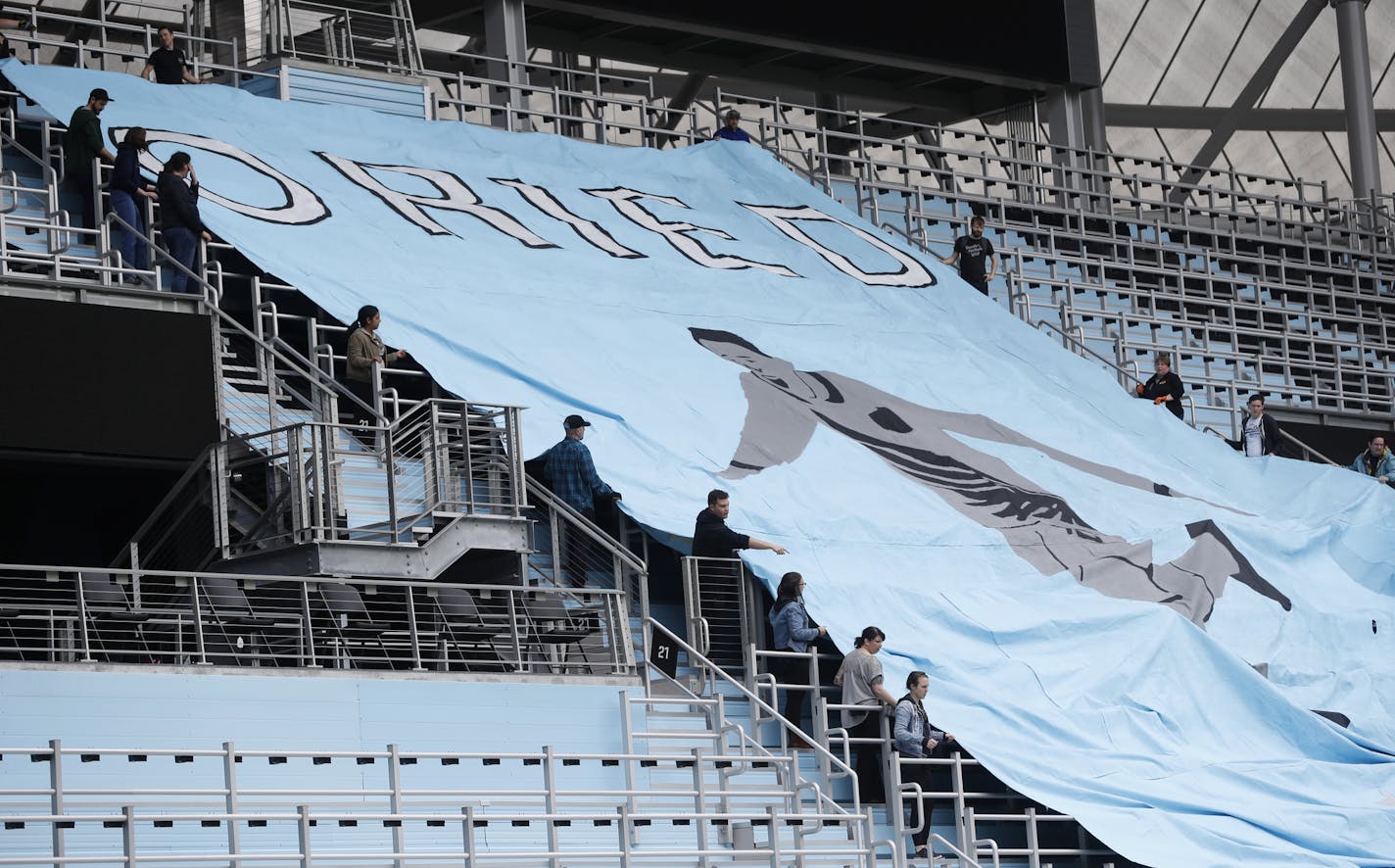 Several dozen volunteers unfurled one of pieces of the tifo for the first time. ] It's the "tifo," a tradition among soccer support groups worldwide to demonstrate their loyalty to the team. RICHARD TSONG-TAATARII &#xa5; richard.tsong-taatarii@startribune.com