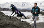 Alaska Department of Transportation program manager Ryan Marlow demonstrates the agency's robotic dog in Anchorage, Alaska, on March 26, 2024. The dev