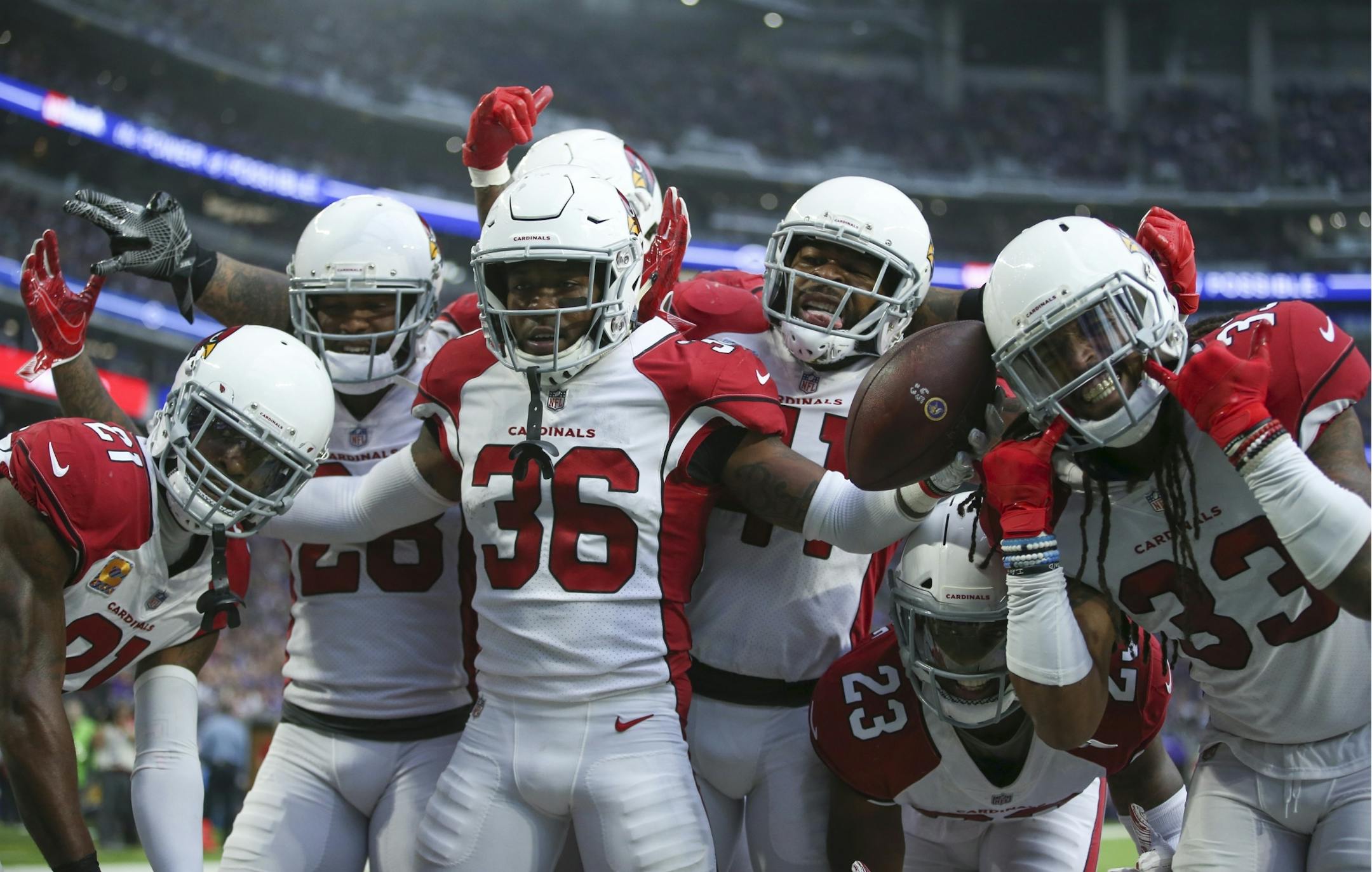 Arizona Cardinals strong safety Budda Baker (36) celebrated his second quarter touchdown after recovering a Minnesota fumble.