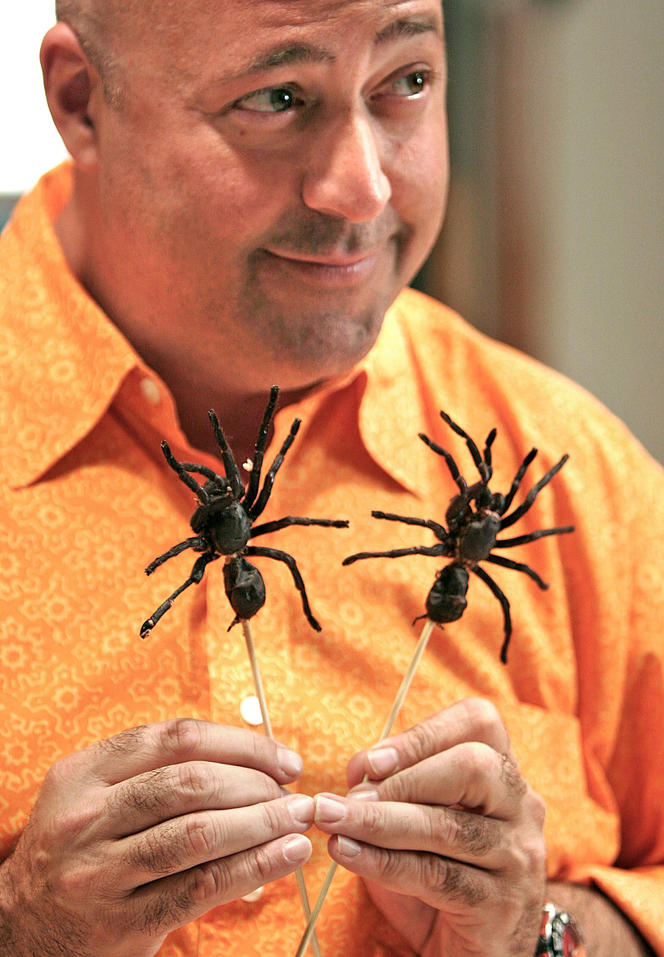 With Teriyaki Tarantula's on a stick, Andrew Zimmern does a promo for his new Travel Channel show Bizarre Foods at Gene Rurka's farm in New Jersey.