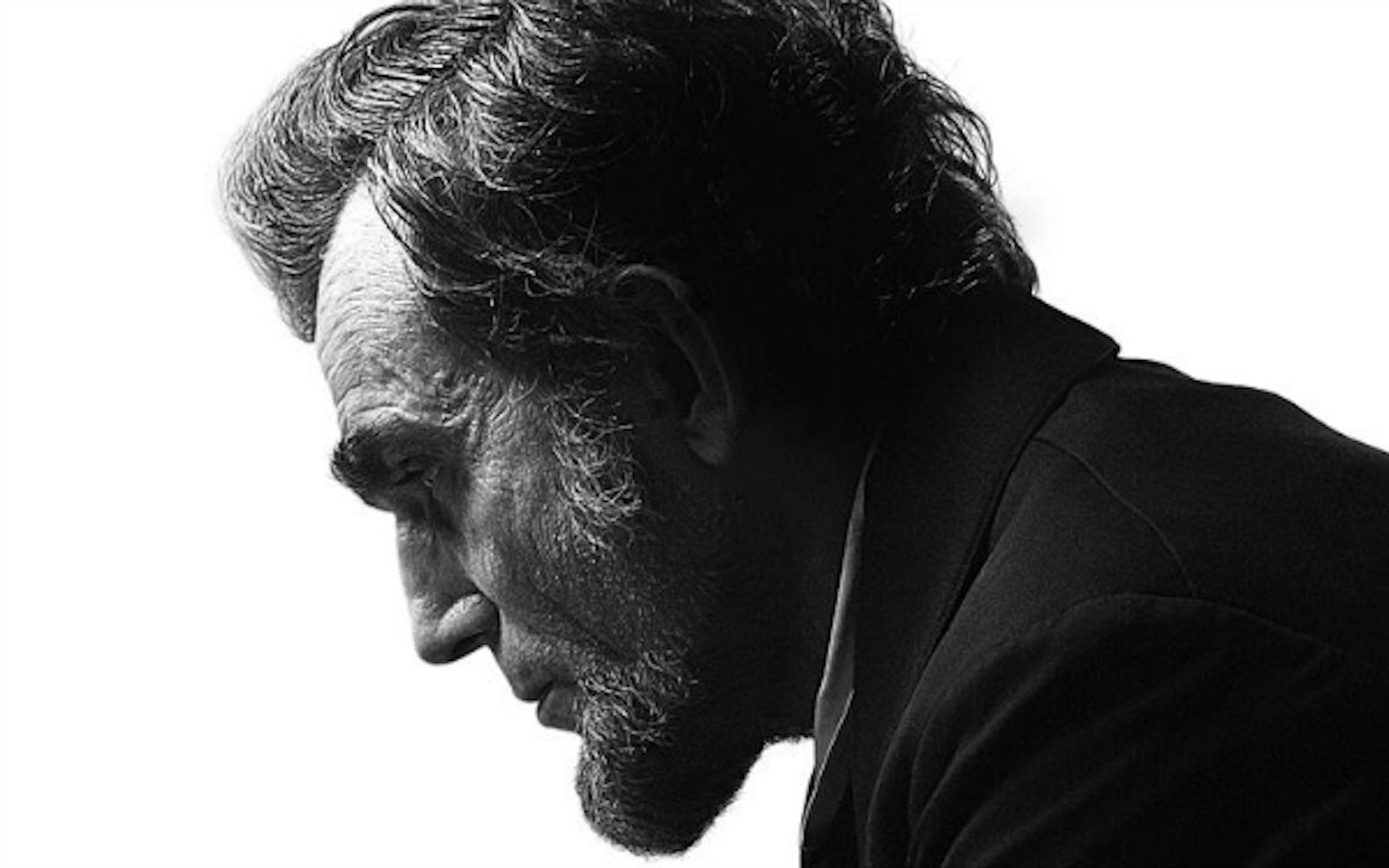 The movie poster from the movie "Lincoln" features actor Daniel Day-Lewis.