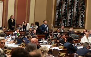 Legislators convene on the House floor on Monday during a special legislative session at the State Capitol.