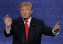 FILE - In this Oct. 19, 2016 file photo, Republican presidential nominee Donald Trump speaks during the third presidential debate with Democratic pres