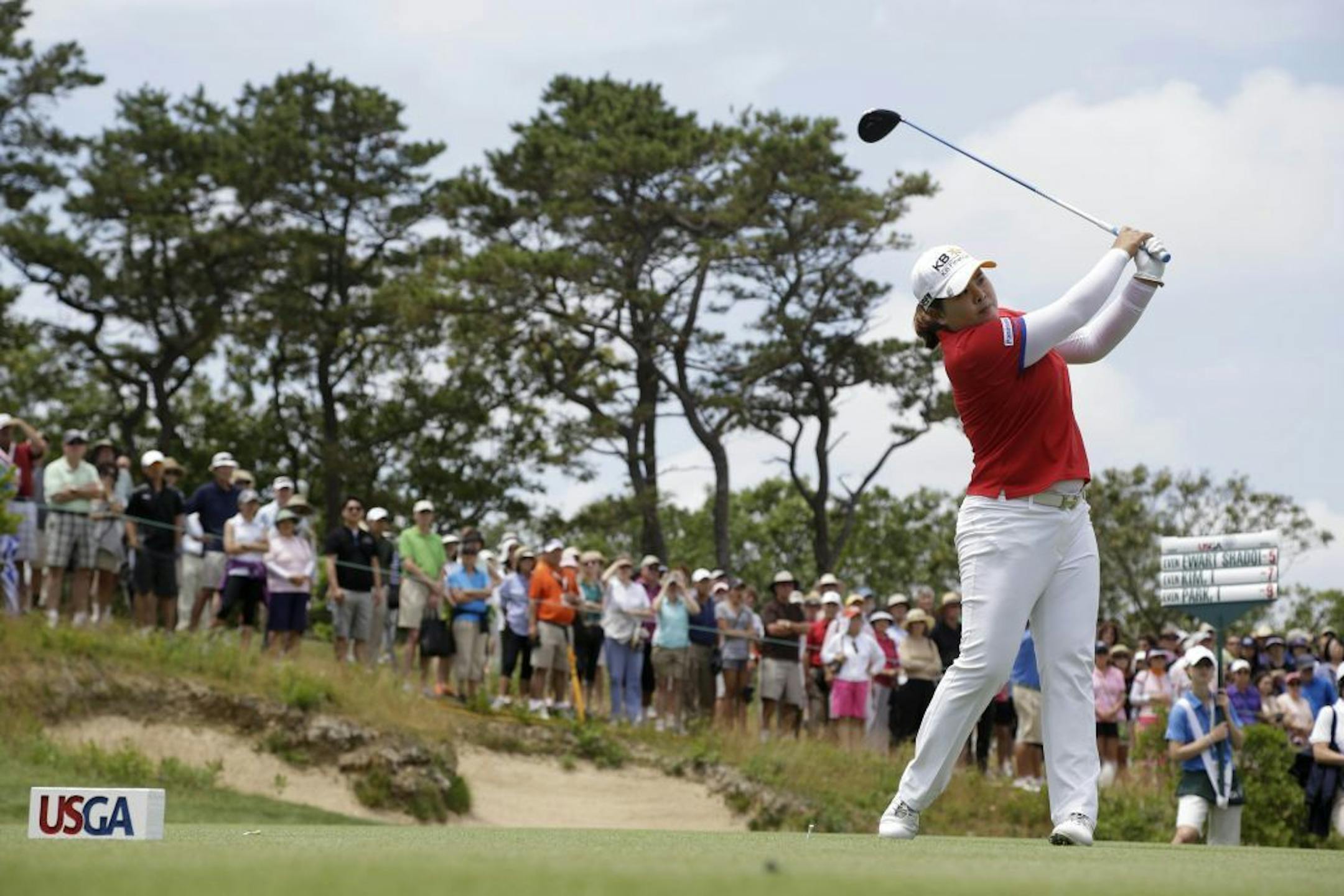 Inbee Park, of South Korea, tees off on the second hole during the third round at the U.S. Women's Open golf tournament at Sebonack Golf Club in Southampton, N.Y., Saturday, June 29, 2013.