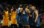The Lynx players on the floor gathered for a huddle after Lynx forward Maya Moore (23) was fouled late in the fourth quarter on Game 4. At right are M