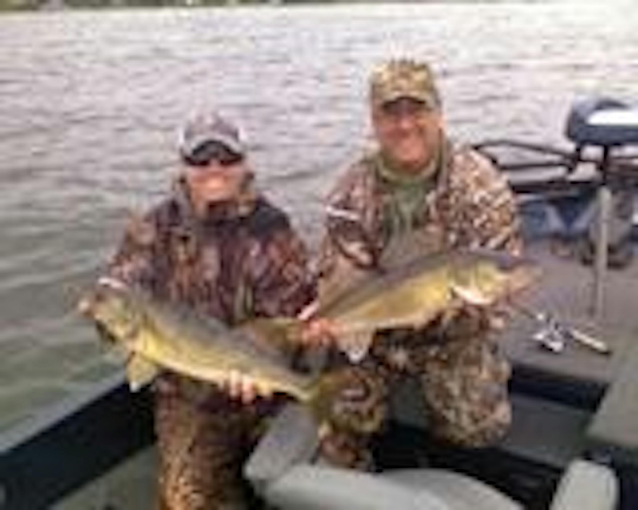 Drake and John Herd With back to back 26 inchers in the weeds during cold front conditions