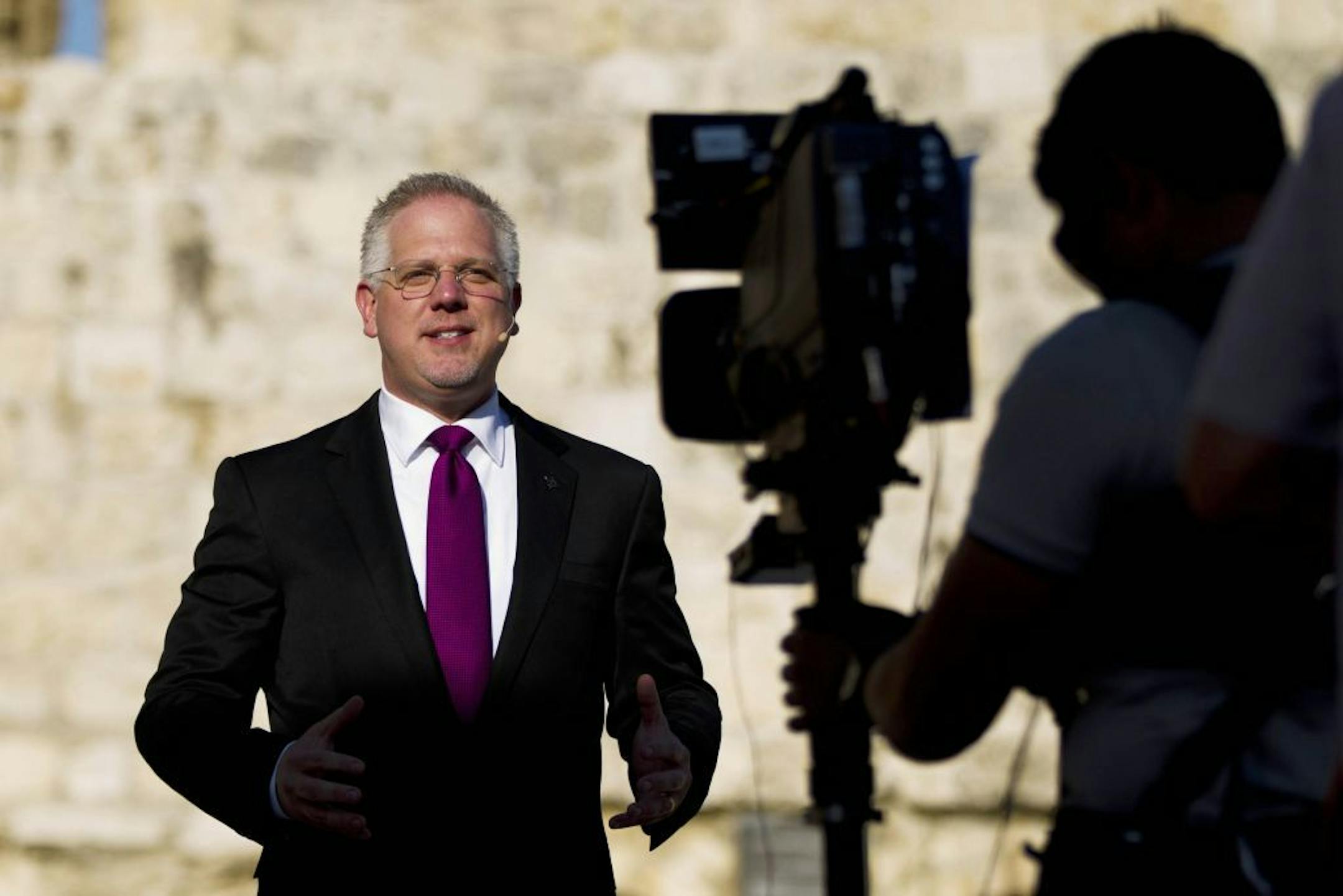 Conservative Christian TV commentator Glenn Beck speaks during a rally in Jerusalem's Old City, Wednesday, Aug. 24, 2011. Beck capped a contentious visit to Israel Wednesday with a rally in the Old City of Jerusalem, adjacent to the disputed holy compound known to Jews as Temple Mount and to Muslims as the Noble Sanctuary. Hundreds of supporters, including Israeli politicians, were on hand to hear the eccentric former Fox TV star in the final leg of his "Restoring Courage" tour of the Holy Land.