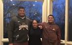 Daniel Faalele (pictured with his mother, Ruth, and brother, Taylor), all 6-9 and 400 pounds of him, will start at right offensive tackle at Ohio Stat