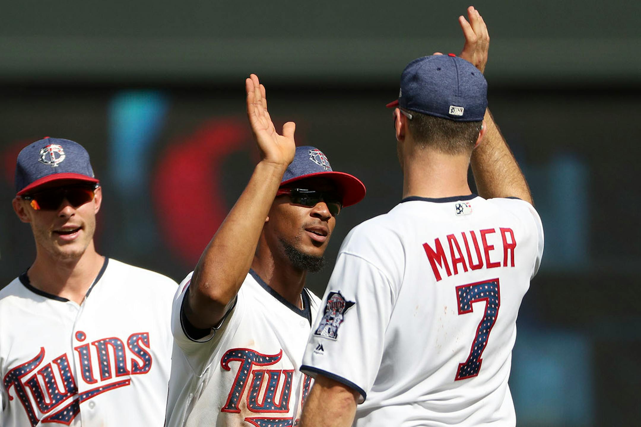 Minnesota Twins center fielder Byron Buxton (25) celebrated the win with Minnesota Twins first baseman Joe Mauer (7).