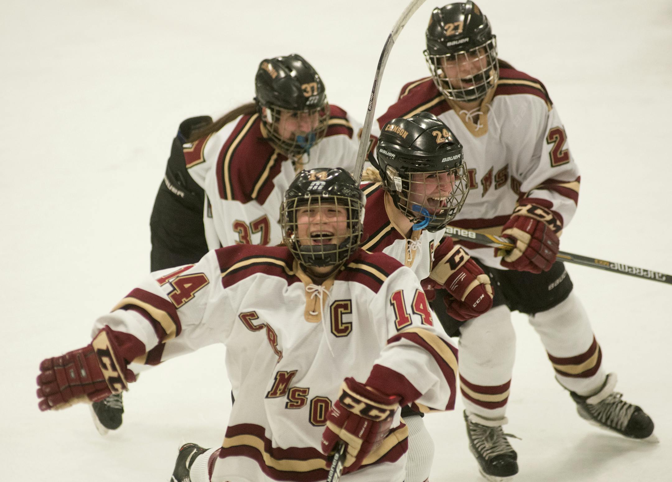 The Maple Grove offense is ecstatic after a second period goal by Lauren Kaufman, front, which gave Maple Grove a 3-1 lead over Centennial High School in the Girls Class 2A Section Final game, Feb. 12, 2016, at the Roseville Ice Arena. ] (Matthew Hintz, Roseville, 021216)