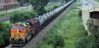 50 million gals of oil a week pass through the Twin Cities from the Bakken. An oil train moves through St Paul, MN July 25, 2014 { tom.wallace@startri