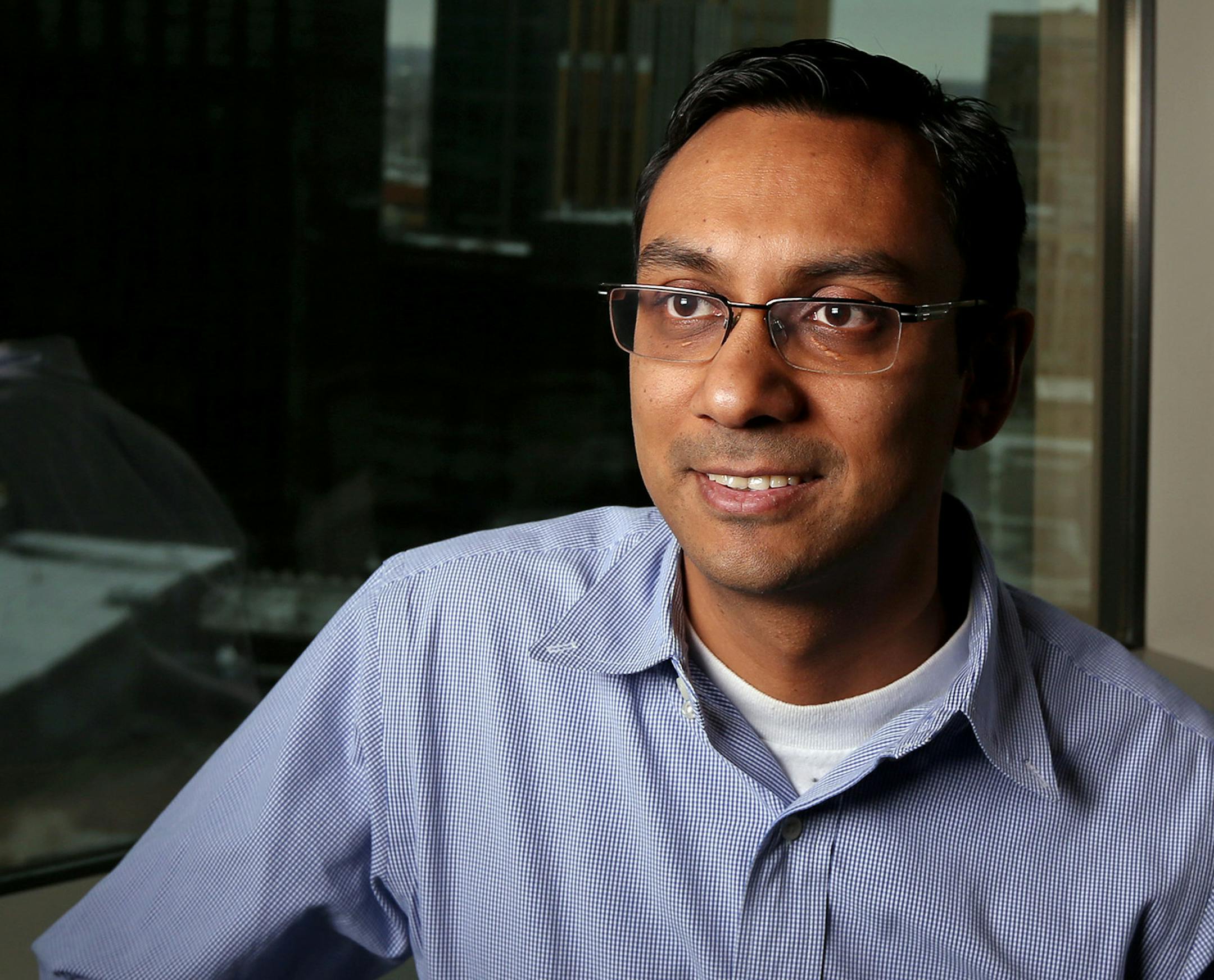 Myna Khan, CEO of one of the fastest growing small businesses in the U.S. His Minneapolis-based company, Field Nation. This portrait was taken at his office Monday November 24 2014 in Minneapolis, Minnesota. ] Jerry Holt Jerry.holt@startribune.com