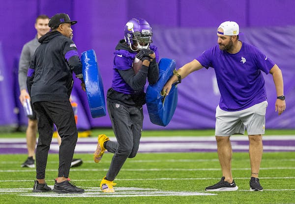 Vikings wide receiver Justin Jefferson, center, was at the team’s practice on Thursday as he prepares to return from a hamstring injury.