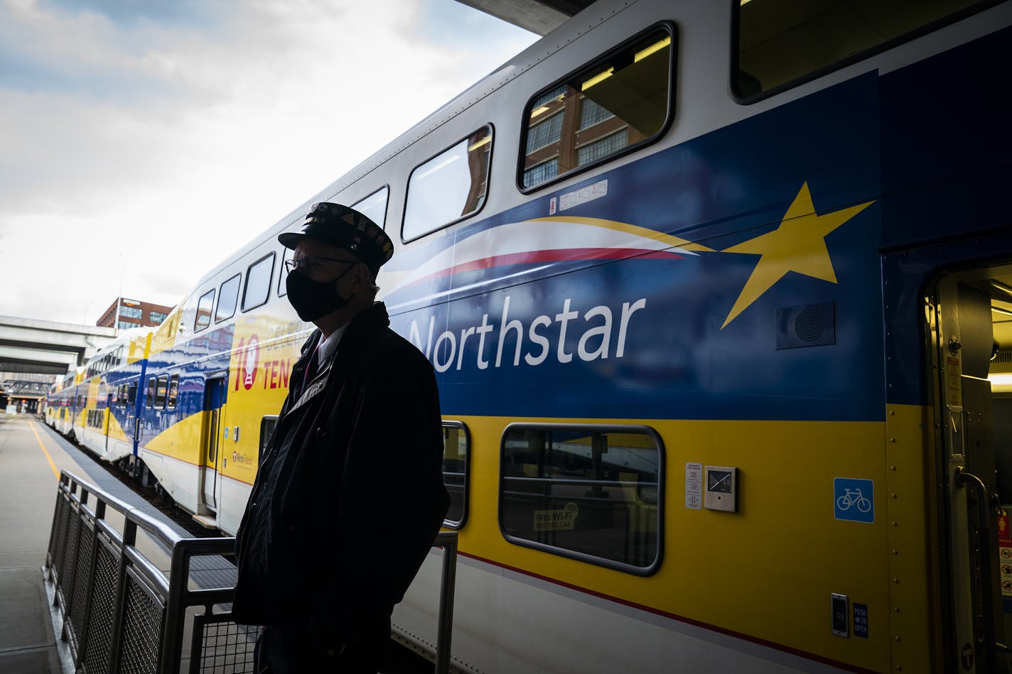 Conductor Mike Szabla stood outside the train prior to departure on the Northstar commuter train at Target Field station in Minneapolis. ] LEILA NAVIDI • leila.navidi@startribune.com BACKGROUND INFORMATION: The Northstar commuter train departing at 4:27 p.m. from Target Field station in downtown Minneapolis on Thursday, October 15, 2020. Metro Transit's chronic under-performer, the Northstar commuter rail, is under new fire in the pandemic from some officials in the northern suburbs, who say the