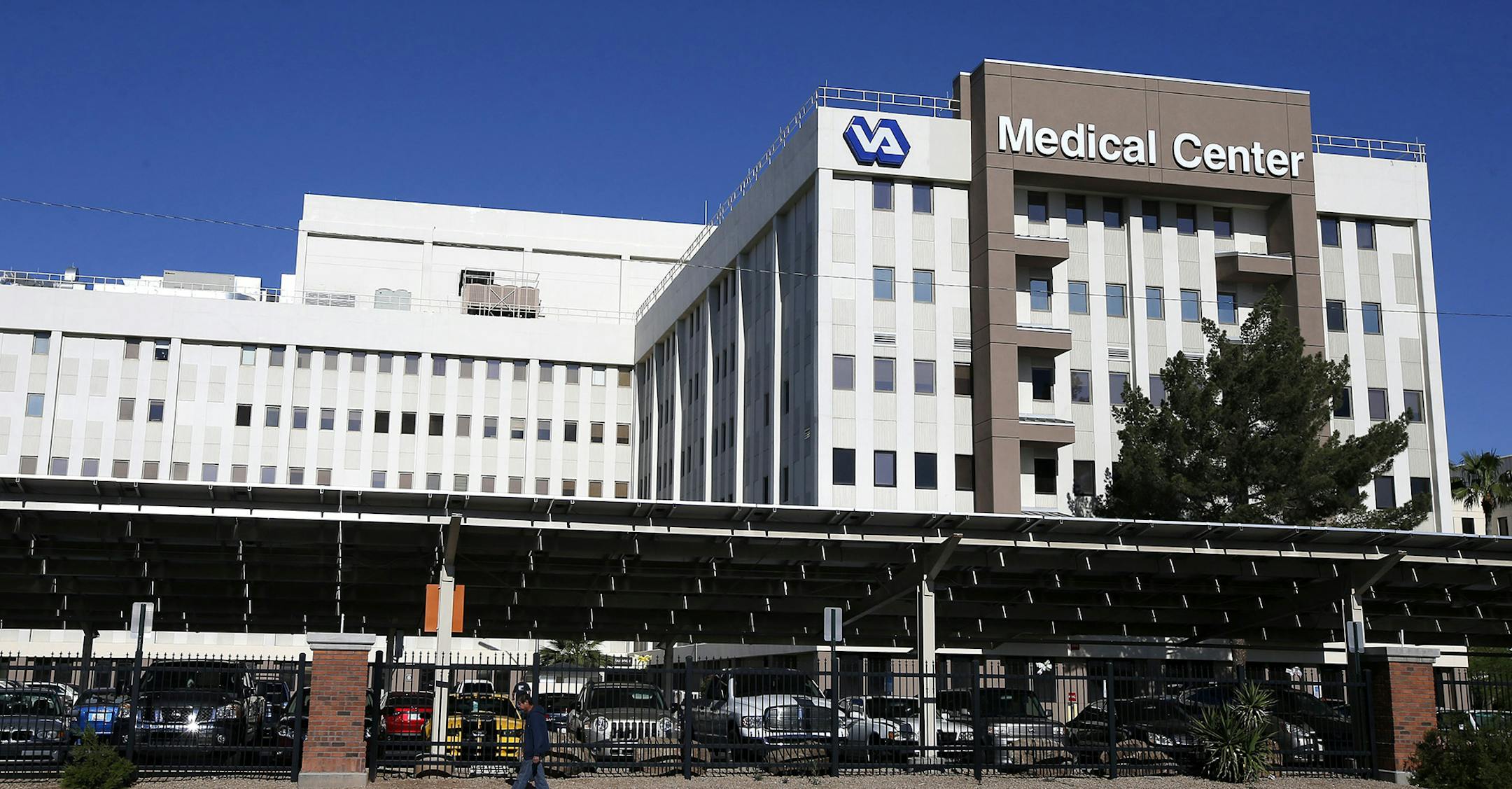 This photo taken April 28, 2014 shows the Phoenix VA Health Care Center in Phoenix. Veterans at the Phoenix veterans hospital waited on average 115 days for their first medical appointment _ 91 days longer than the hospital reported, the Veterans Affairs Department‚Äôs inspector general said Wednesday. Rep. Jeff Miller, R-Fla., chairman of the House Veterans Affairs Committee, and Sen. John McCain, R-Ariz., immediately called for VA Secretary Eric Shinseki to resign. Miller also