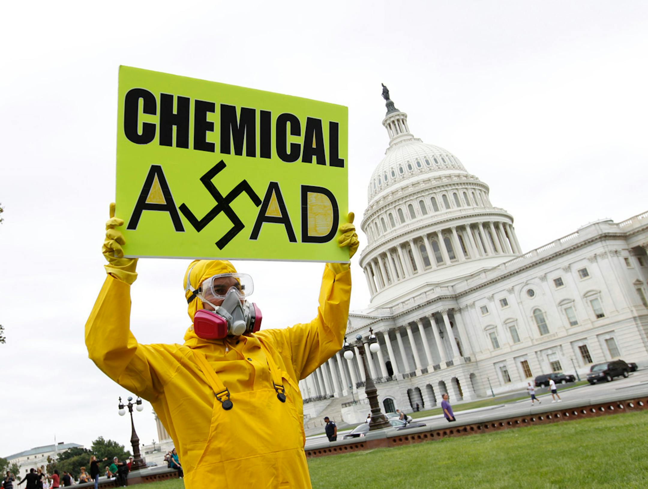 Demonstrators opposed to the government of Syrian President Bashar Assad gather on the lawn of the Capitol in Washington on Sept. 9, 2013.