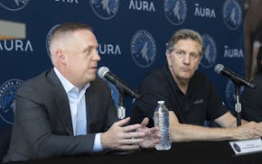 Tim Connelly, left, flanked by coach Chris Finch, has struck successful deals repeatedly in his time as Timberwolves president of basketball operation