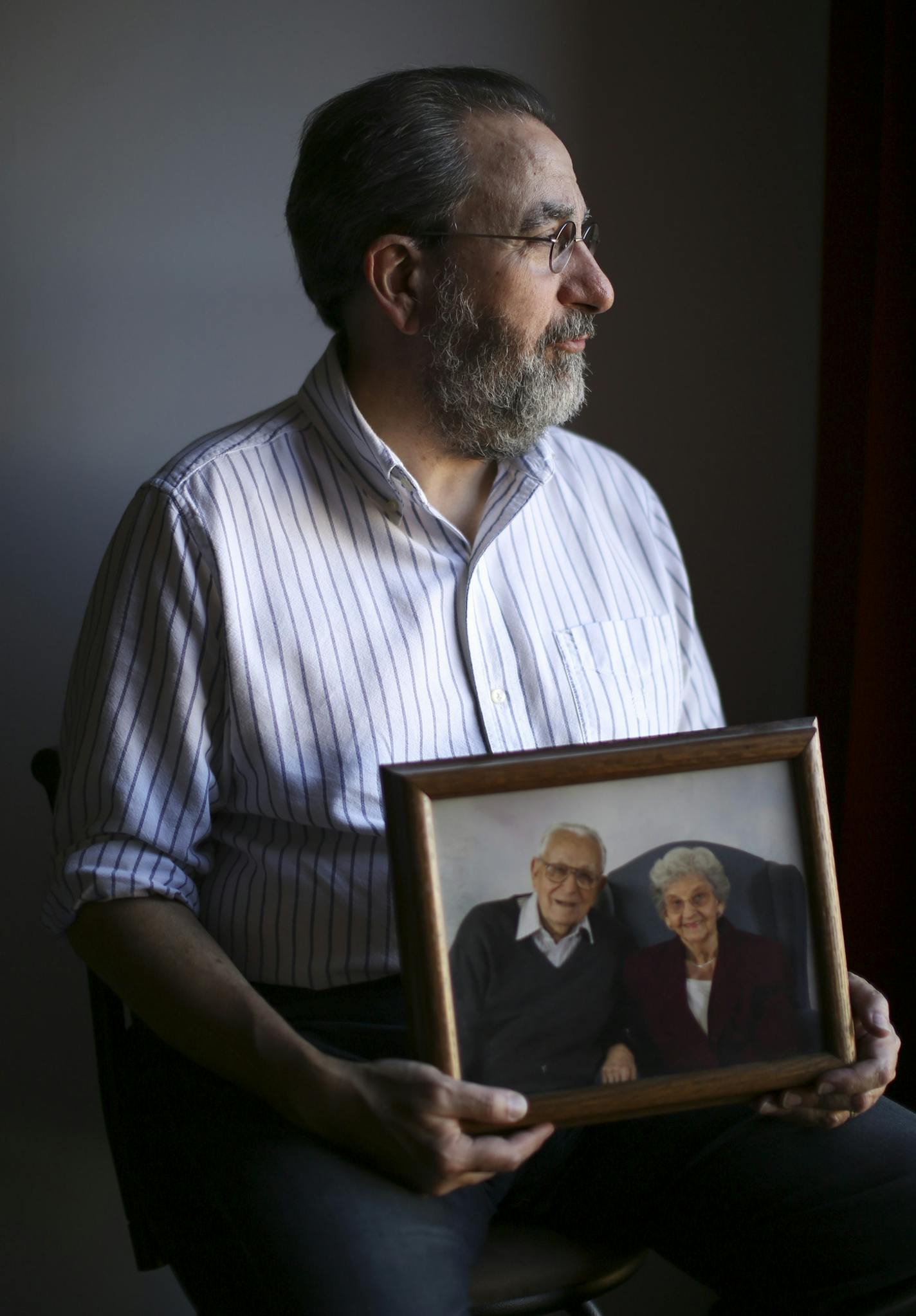 Bill Hanley, held a photograph of his parents while photographed in his Lowertown condo, had a family phone conversation to learn his mother's end-of-life wishes before she died. ] JEFF WHEELER &#x2022; jeff.wheeler@startribune.com The Obama administration this summer proposed reimbursing doctors for end-of-life planning conversations with Medicare patients. The change, which applies to Americans ages 65 and up, is slated to begin in January. While local advocates laud the change, many agree tha