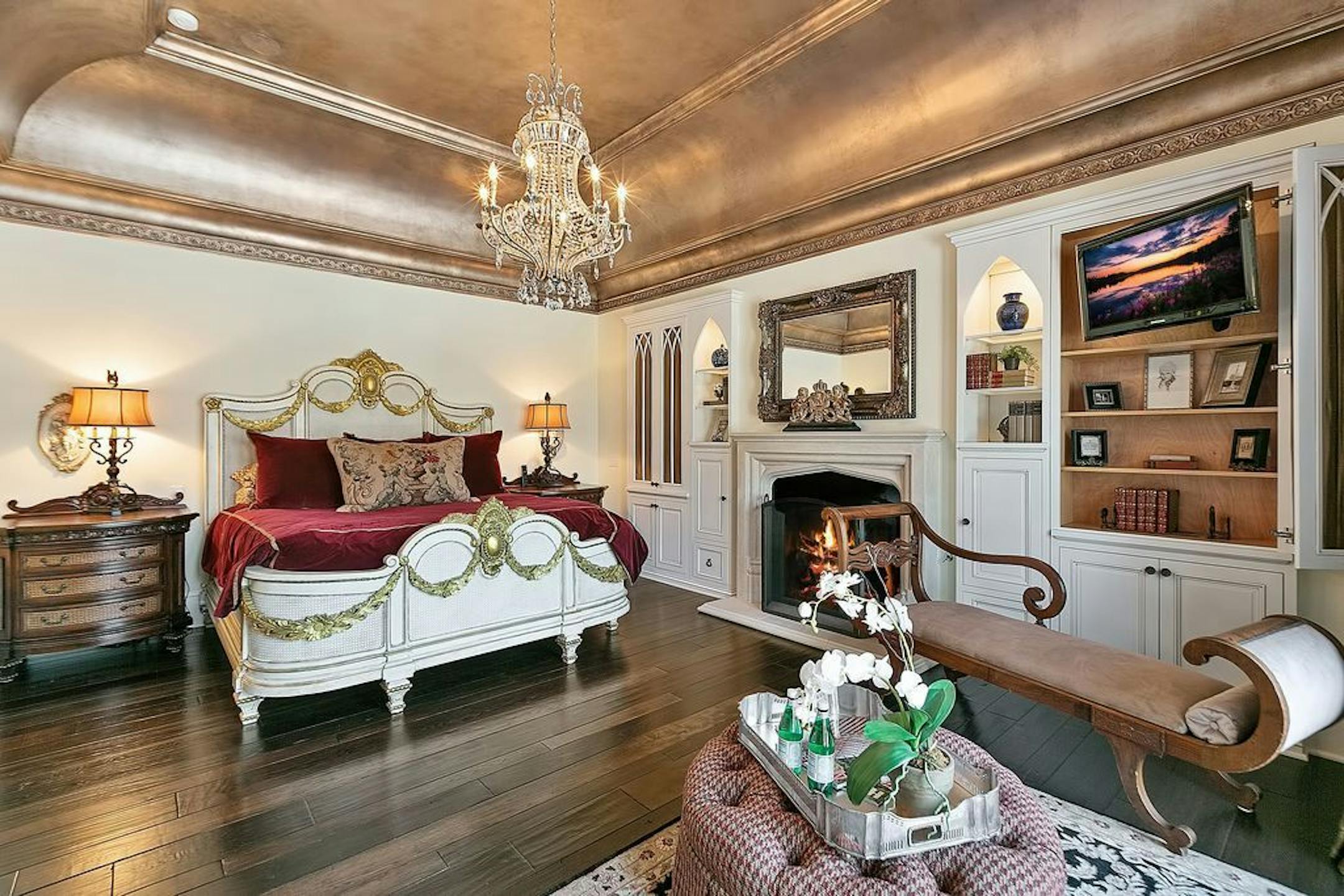 The master bedroom features a metallic paint treatment on the ceiling.