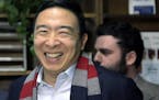 Democratic presidential candidate former technology executive Andrew Yang smiles after filing to have his name listed on the New Hampshire primary bal