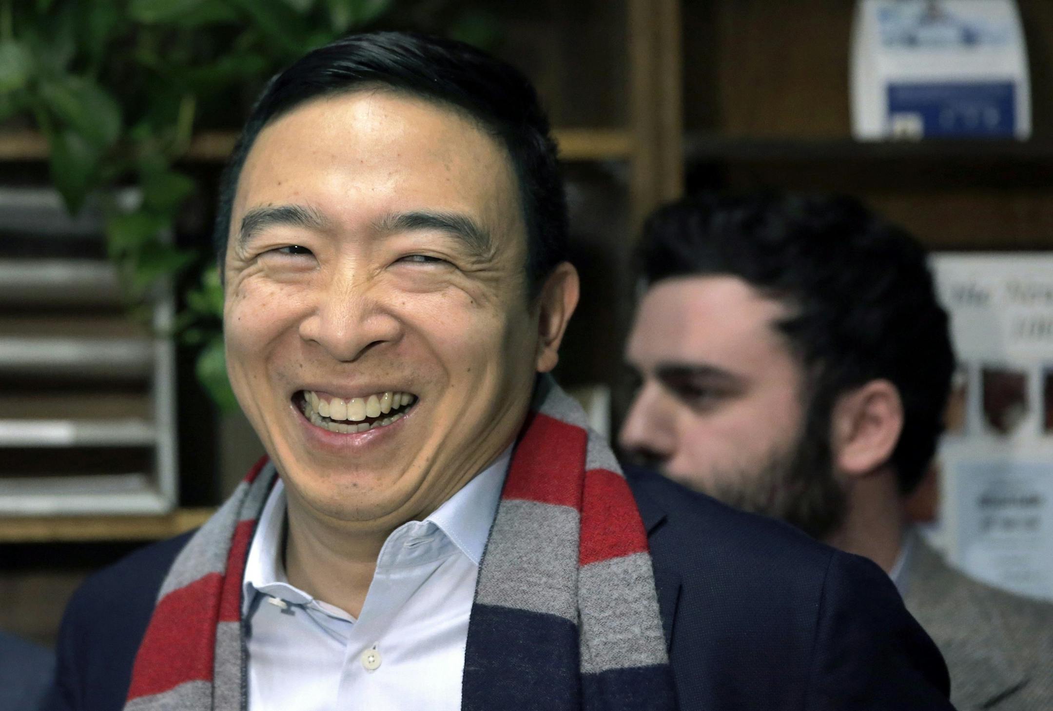 Democratic presidential candidate former technology executive Andrew Yang smiles after filing to have his name listed on the New Hampshire primary ballot, Friday, Nov. 8, 2019, in Concord, N.H. (AP Photo/Charles Krupa)