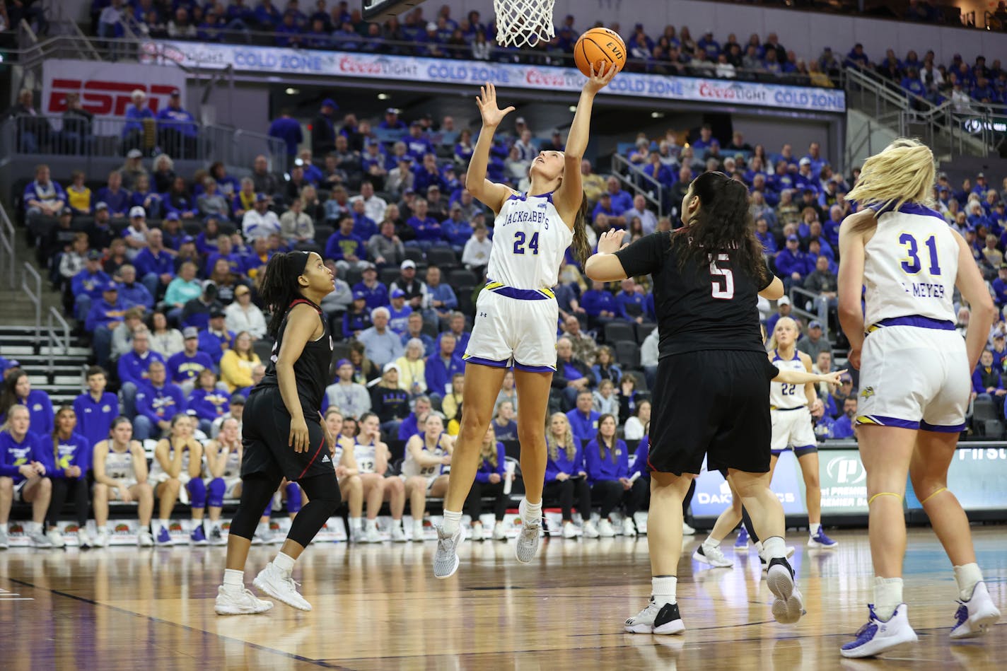 South Dakota State's Mesa Byom (24) puts up a layup during the second half of an NCAA college basketball game against Omaha in the Summit League women's tournament championship Tuesday, March 7, 2023, in Sioux Falls, S.D. (AP Photo/Josh Jurgens)