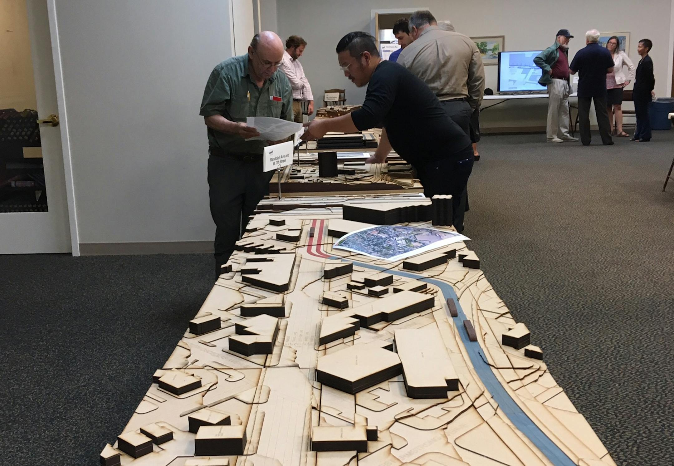 St. Paul and Minneapolis neighbors examined models of the Riverview Corridor, which will run from downtown St. Paul to the Minneapolis-St. Paul International Airport and Mall of America.