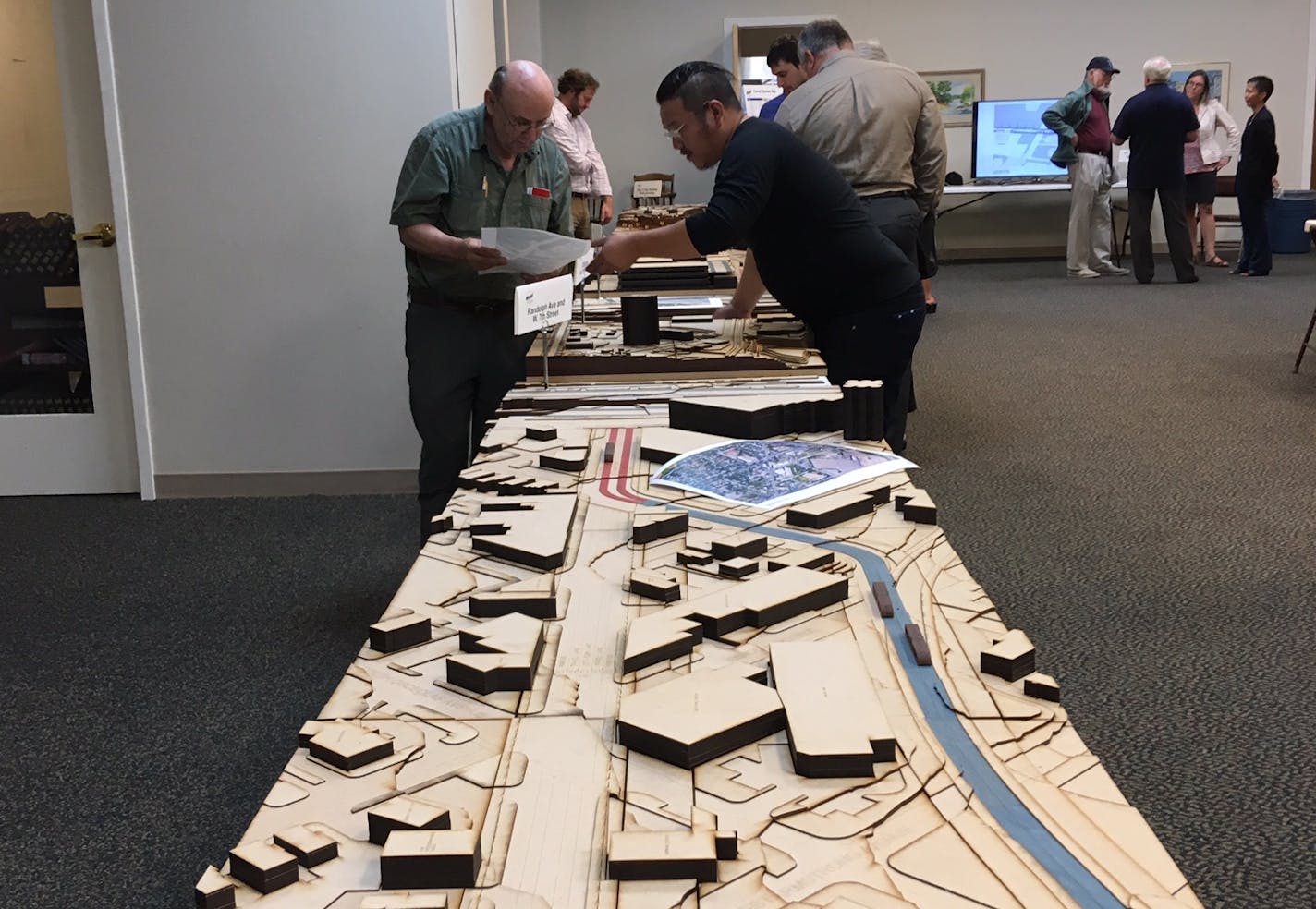 St. Paul and Minneapolis neighbors examined models of the Riverview Corridor, which will run from downtown St. Paul to the Minneapolis-St. Paul International Airport and Mall of America.