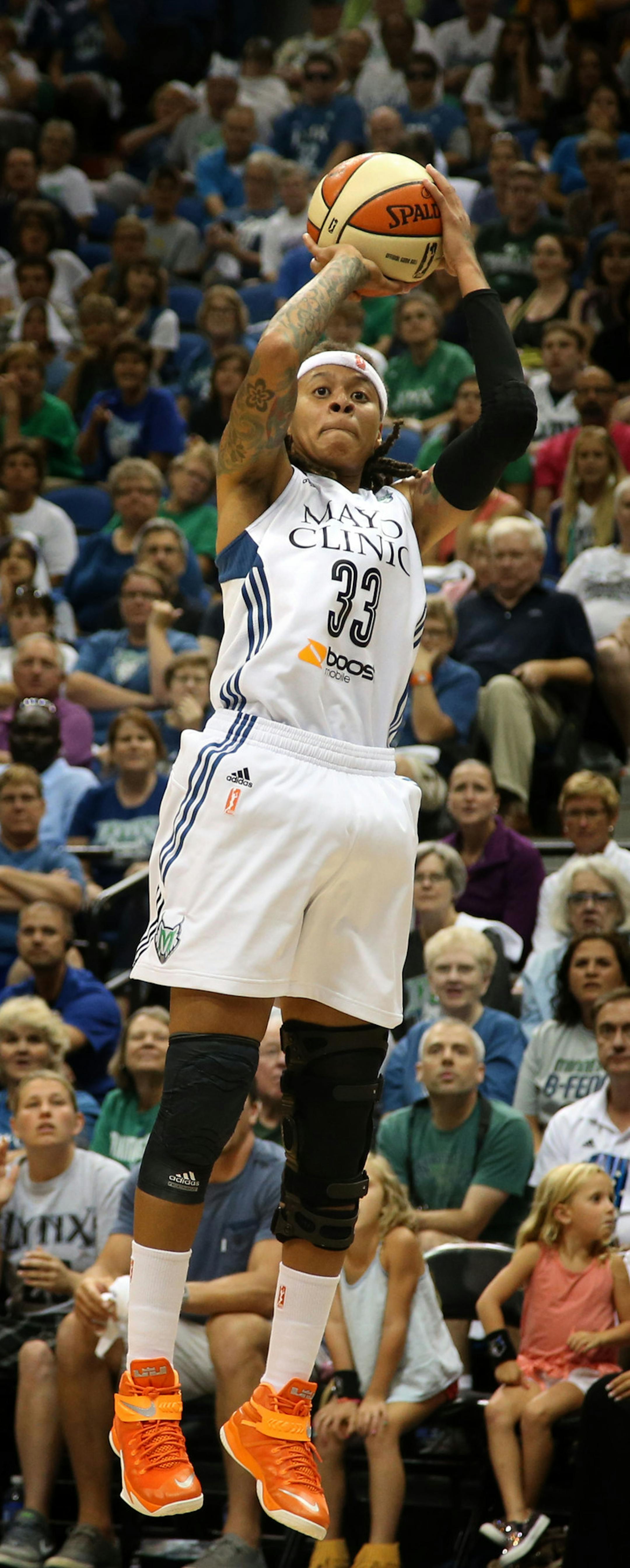 Lynx Seimone Augustus pulled up for a jumper during the fourth quarter ] (KYNDELL HARKNESS/STAR TRIBUNE) kyndell.harkness@startribune.com Lynx vs San Antonio Stars during the western conference semifinals at Target Center in Minneapolis Min., Thursday, August, 21, 2014. Lynx won 88-84.