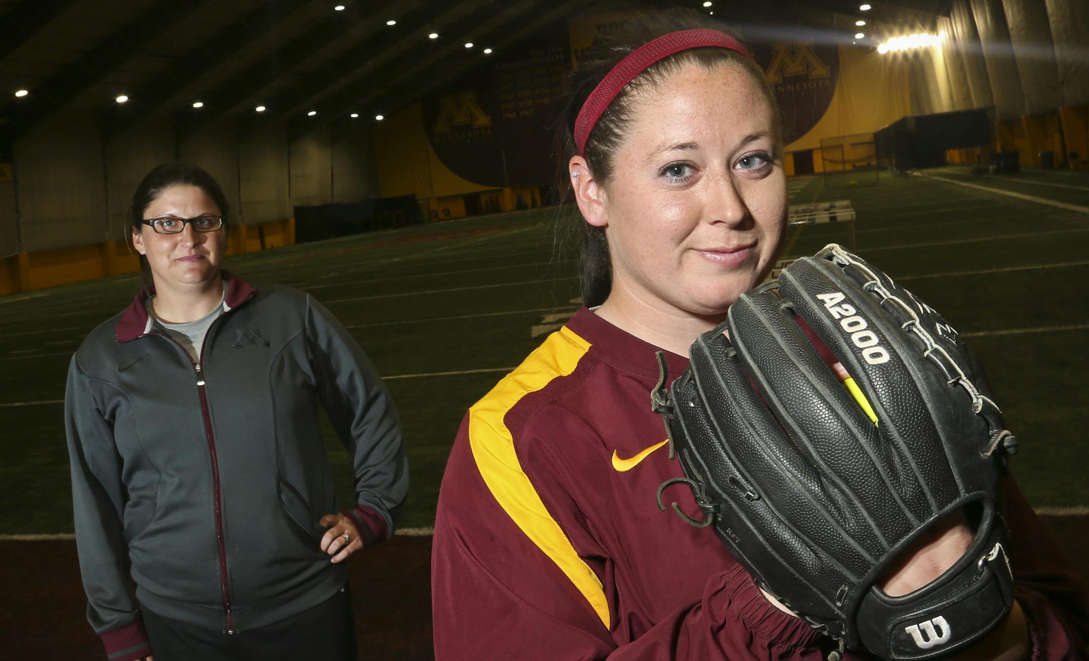 Standout pitcher Sara Moulton is one of 25 finalists for NCAA player of the year. She posed for a picture with her pitching coach Piper Marten Ritter (at left) at the University of Minnesota campus in Minneapolis, Minn., on Wednesday, April 16, 2014. ] RENEE JONES SCHNEIDER ‚Ä¢ (reneejones@startribune.com)