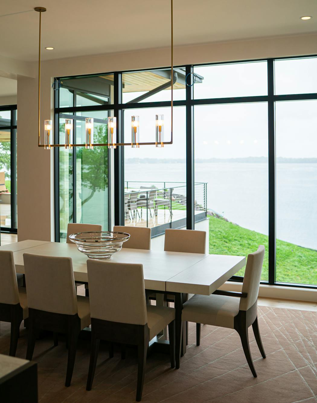 A Chamont chandelier by Jonathan Browning at a home in Tonka Bay with views of Lake Minnetonka.
