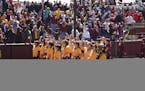 Gopher softball players sang the Minnesota Rouser after their win with the fans at the University of Minnesota in Minneapolis, Minn., on Monday, May 2