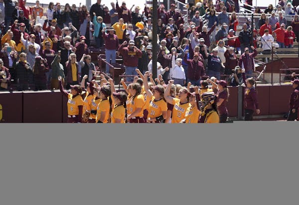 Gopher softball players sang the Minnesota Rouser after their win with the fans at the University of Minnesota in Minneapolis, Minn., on Monday, May 2