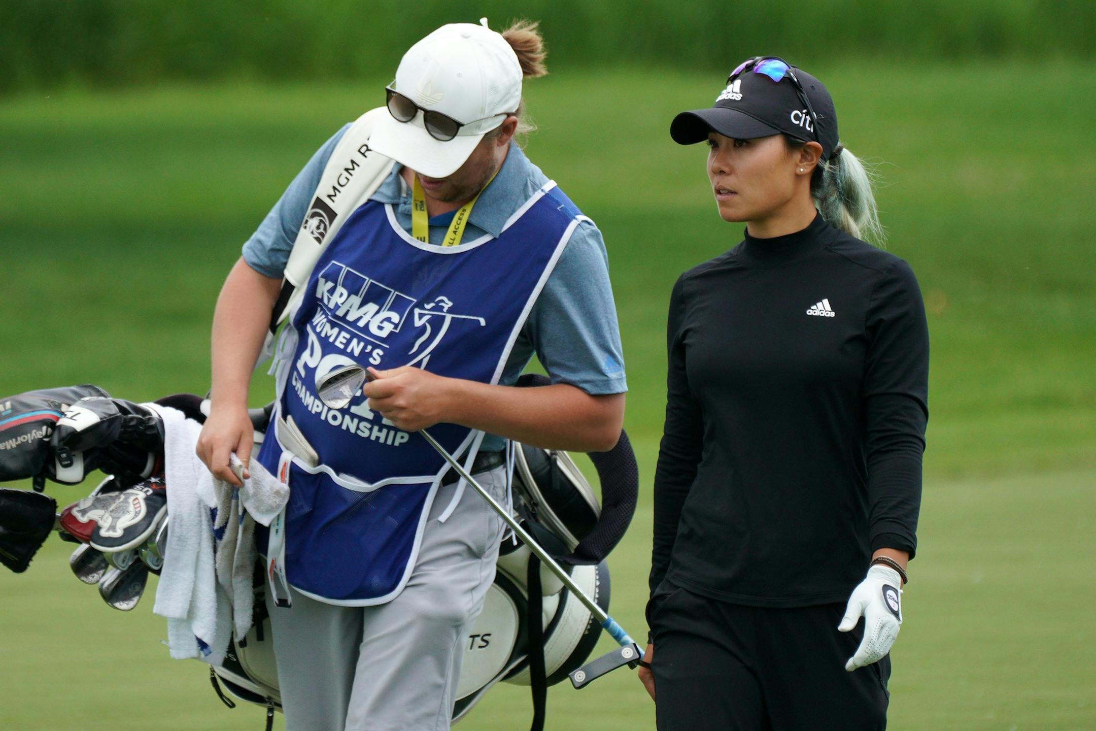 Danielle Kang walked with her caddie on the 16th fairway Tuesday afternoon.