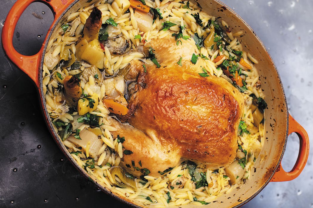 Chicken in a pot with lemon and orzo from Nigella Lawson’s newest cookbook, “Cook, Eat, Repeat: Ingredients, Recipes, and Stories by Nigella Lawson” (Ecco, 2021).