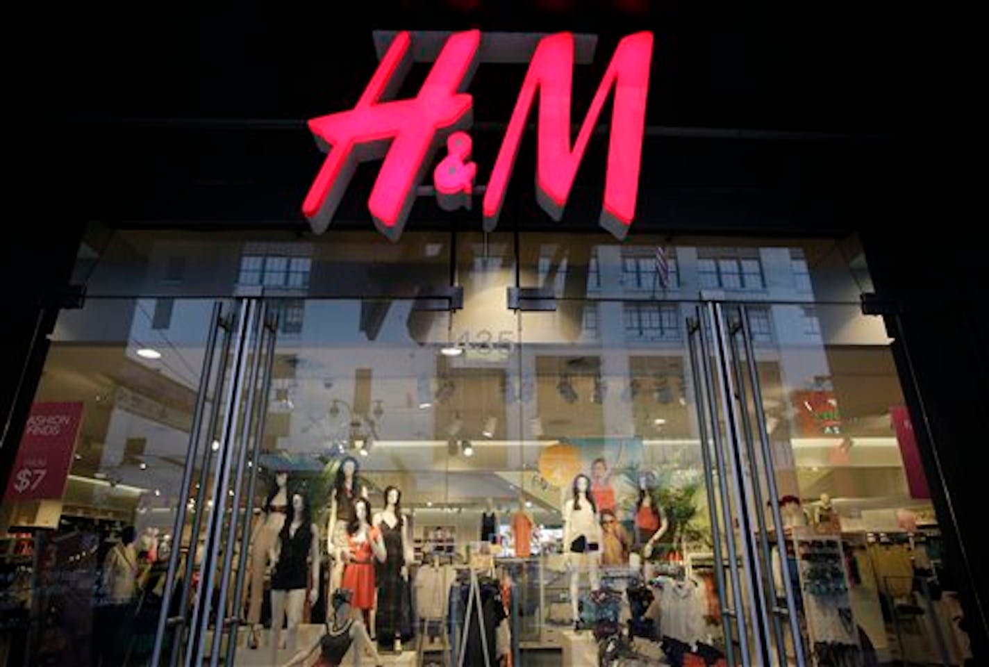 FILE - In this May 31, 2013, file photo, an H&M store is shown in New York. H&M, Hennes & Mauritz reports quarterly earnings in Thursday, March 27, 2014. (AP Photo/Mark Lennihan, File)