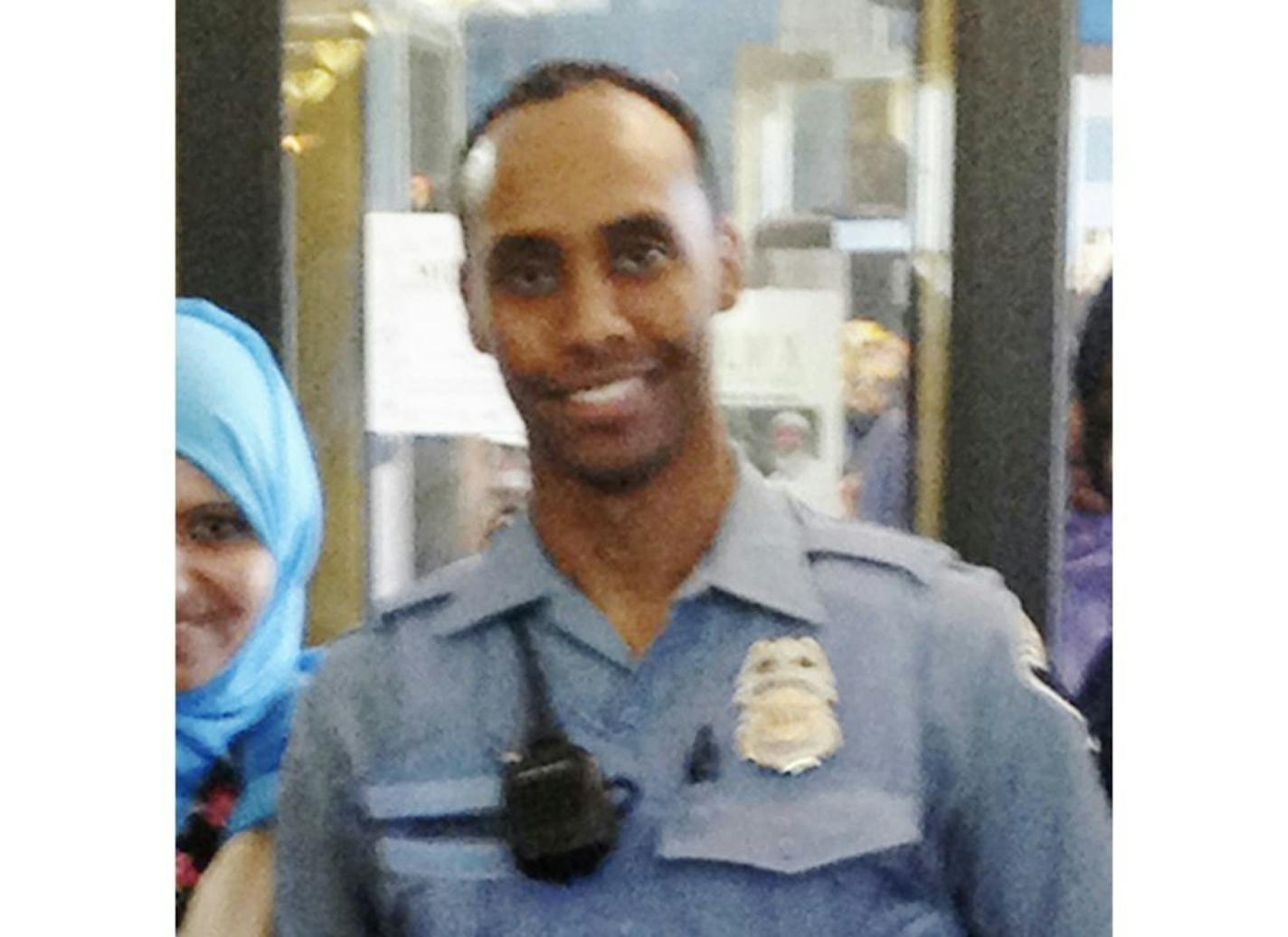 In this May 2016 image provided by the City of Minneapolis, police officer Mohamed Noor poses for a photo at a community event welcoming him to the Minneapolis police force. Noor, a Somali-American, has been identified by his attorney as the officer who fatally shot Justine Damond, of Australia, late Saturday, July 15, 2017, after she called 911 to report what she believed to be an active sexual assault.