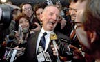 FILE - This May 5, 1992 file photo shows Texas billionaire Ross Perot laughing after saying "Watch my lips," in response to reporters asking when he p