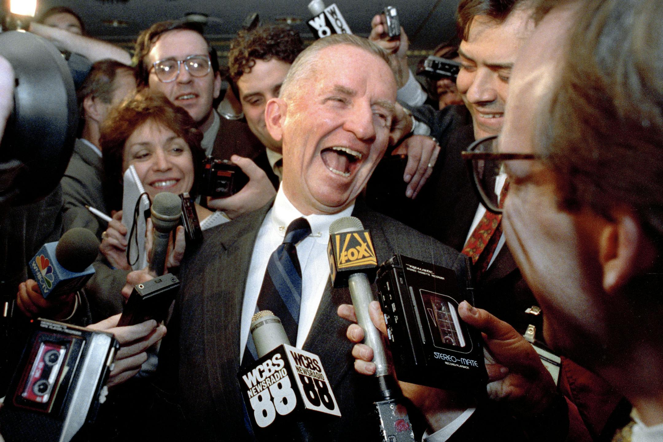 FILE - This May 5, 1992 file photo shows Texas billionaire Ross Perot laughing after saying "Watch my lips," in response to reporters asking when he plans to formally enter the presidential race. Perot, the colorful, self-made Texas billionaire who rose from a childhood of Depression-era poverty and twice ran for president as a third-party candidate, has died. He was 89. (AP Photo/Richard Drew. File)