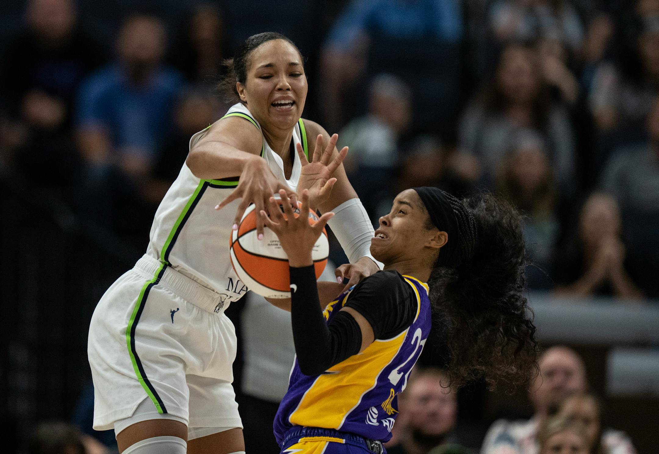 Minnesota Lynx forward Napheesa Collier (24) stripped the ball from Los Angeles Sparks guard Jordin Canada (21) in the second half.
