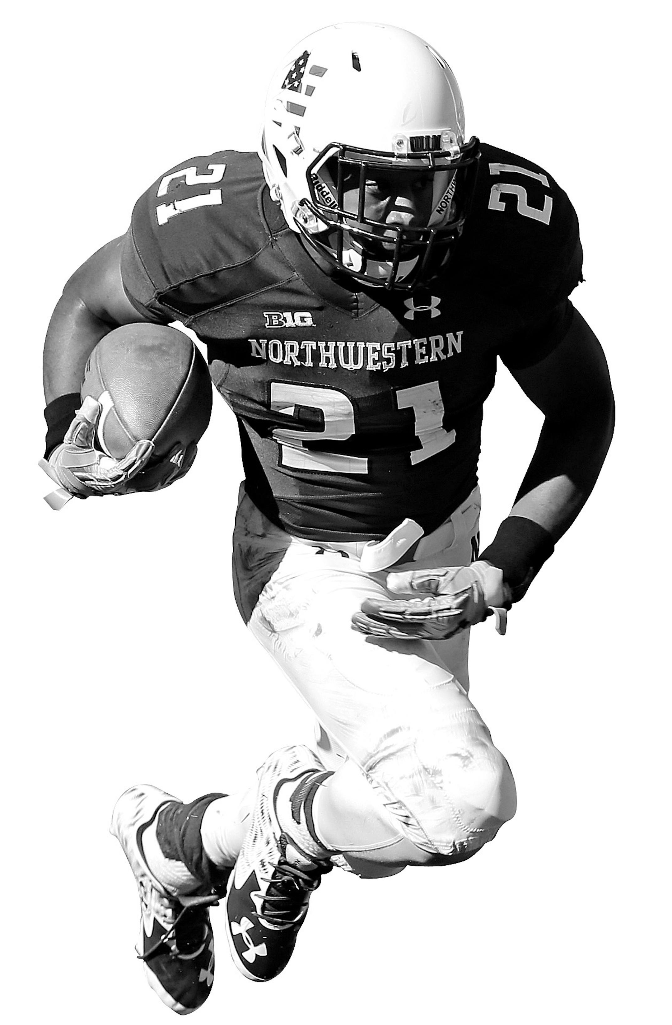 Northwestern running back Justin Jackson, right, runs with the ball past Eastern Illinois defensive back Anthony Goodman during the first half of an NCAA college football game, Saturday, Sept. 12, 2015, in Evanston, Ill. (AP Photo/Nam Y. Huh)