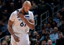 Wolves forward Taj Gibson left the Memphis game holding his shoulder in the first quarter Monday night.