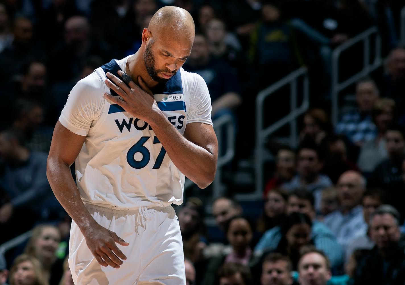 Wolves forward Taj Gibson left the Memphis game holding his shoulder in the first quarter Monday night.