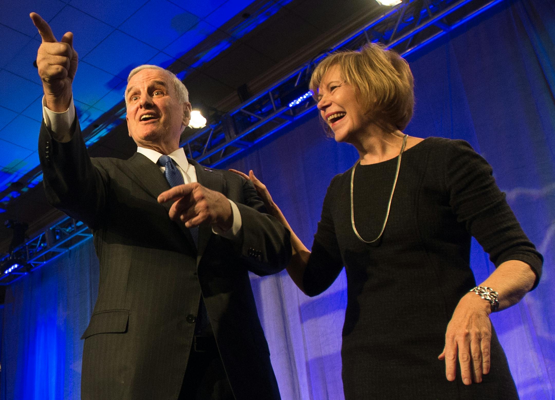 Governor Mark Dayton and Lieutenant Governor Tina Flint Smith wave to their supporters after delivering their victory speeches at Tuesday night's election party at the DFL Headquarters. ] AARON LAVINSKY • aaron.lavinsky@startribune.com Photos from the election party at the DFL Headquarters Tuesday, Nov. 4, 2014 at the Hilton Hotel in Minneapolis.