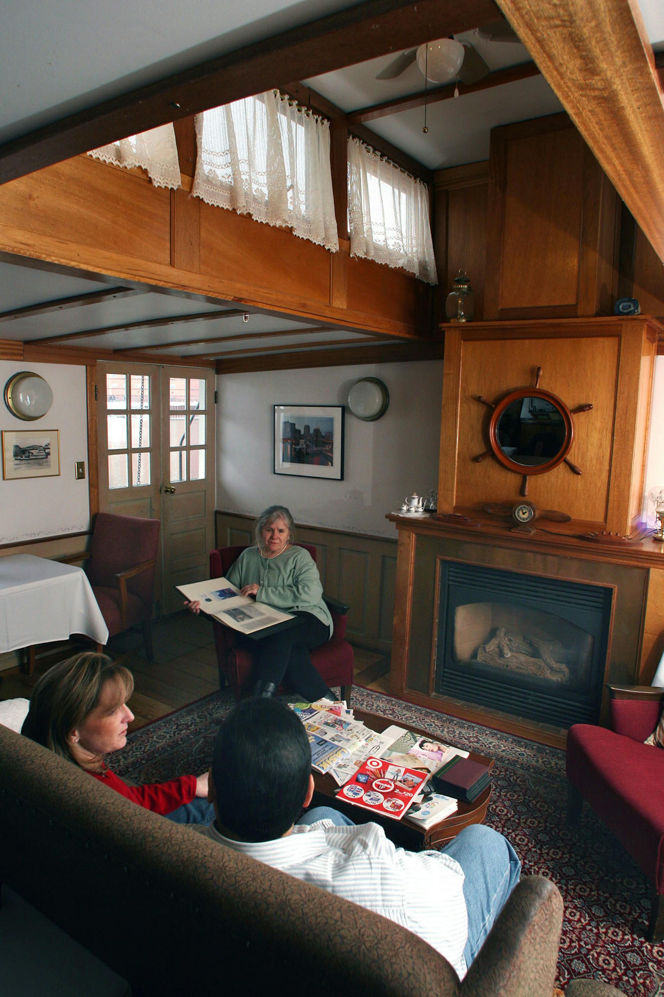 Guests sit in the salon in the winter - when the riverboat B&B is still open but much less busy. (Photo from 2005).