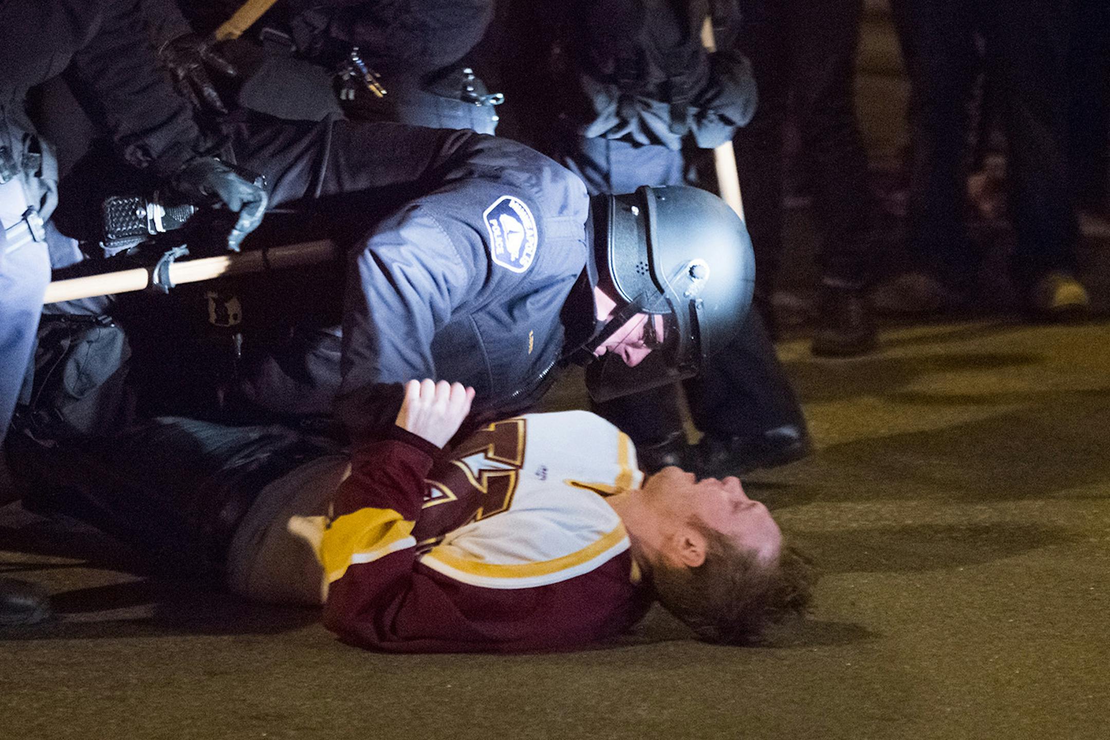 Crowds got rowdy and police massed in the Dinkytown area after the Gophers lost to Union in the NCAA hockey championship April 12, 2014.