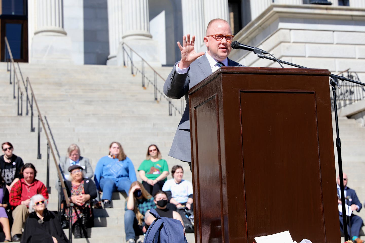 Chase Glenn, executive director of Alliance for Full Acceptance, speaks at a rally against a South Carolina bill banning gender-affirming care for min
