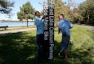 Park workers put up new dual-language signs recognizing Lake Calhoun's Dakota name in 2015. The Park Board is now working with the city's Art in Publi