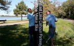 Park workers put up new dual-language signs recognizing Lake Calhoun's Dakota name in 2015. The Park Board is now working with the city's Art in Publi