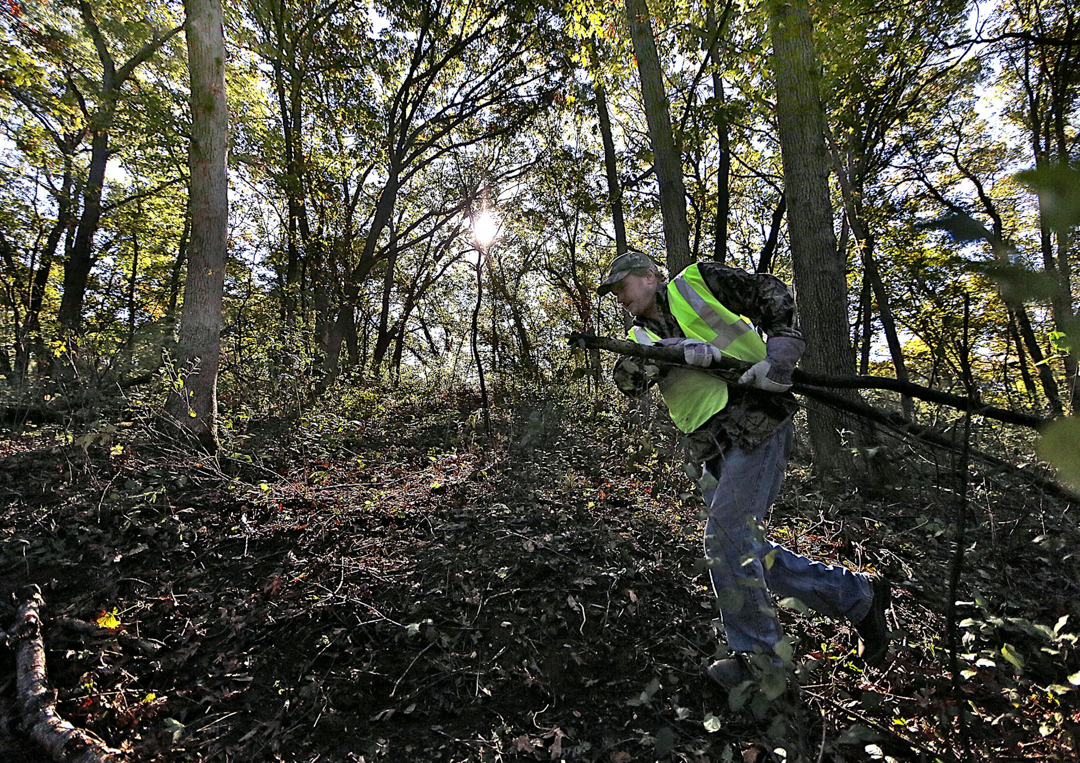 Dan VanSloun, Eagan, carried buckthorn, shrubs and other plant material to a collection point in a remote area of Lebanon Hills Regional Park in Eagan. ] JIM GEHRZ ï james.gehrz@startribune.com / Eagan, MN / October 3, 2015 / 9:00 AM ñ BACKGROUND INFORMATION: Are you willing to unload containers of hazardous waste? Maybe youíve got some free time to develop an internal control audit program for the city of Inver Grove Heightsí Finance Department? Then Dakota Countyís got